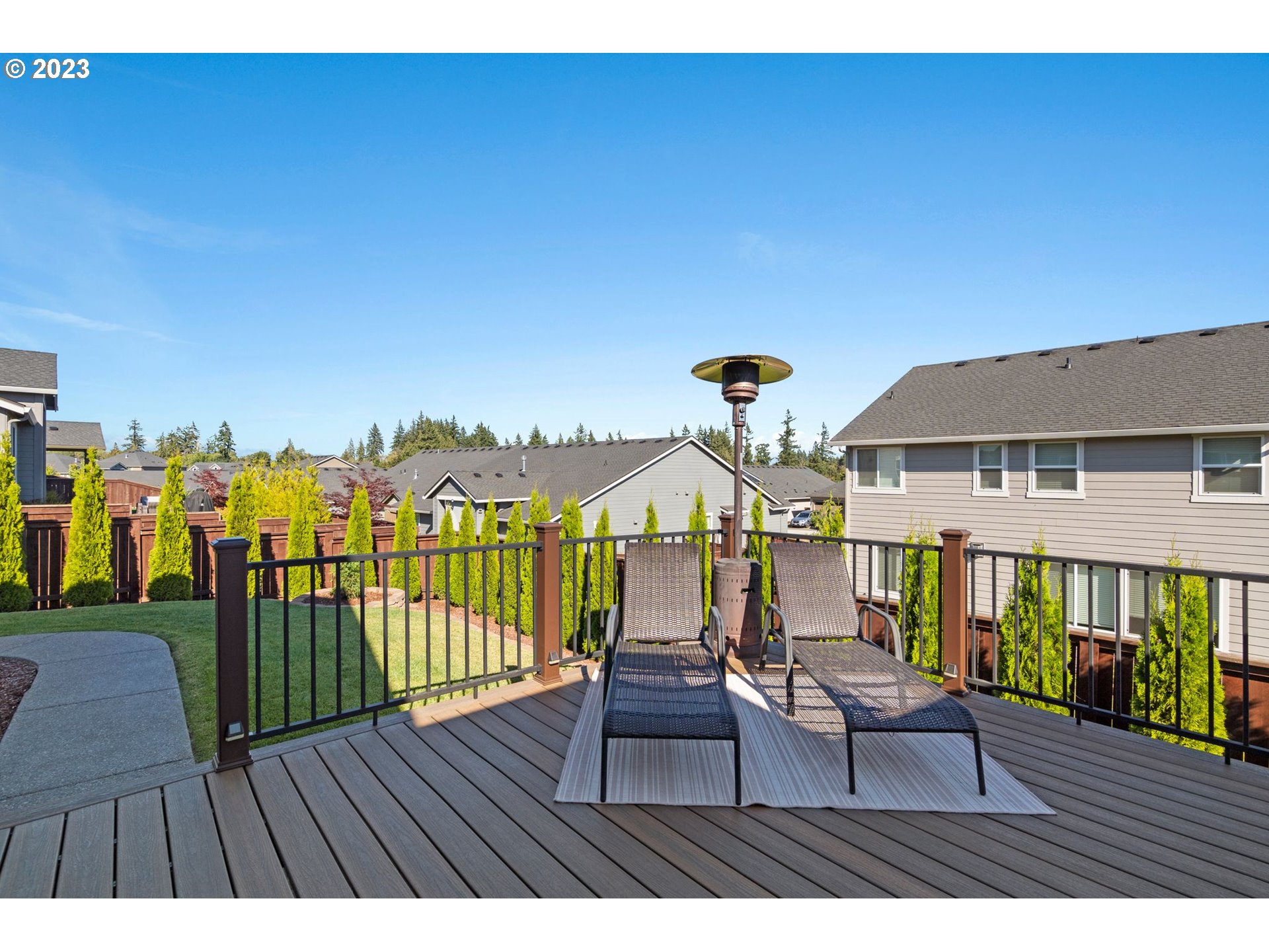 4805 South 17th Way Ridgefield, WA 98642 - Photo 29 of 33 a view of a balcony with chairs