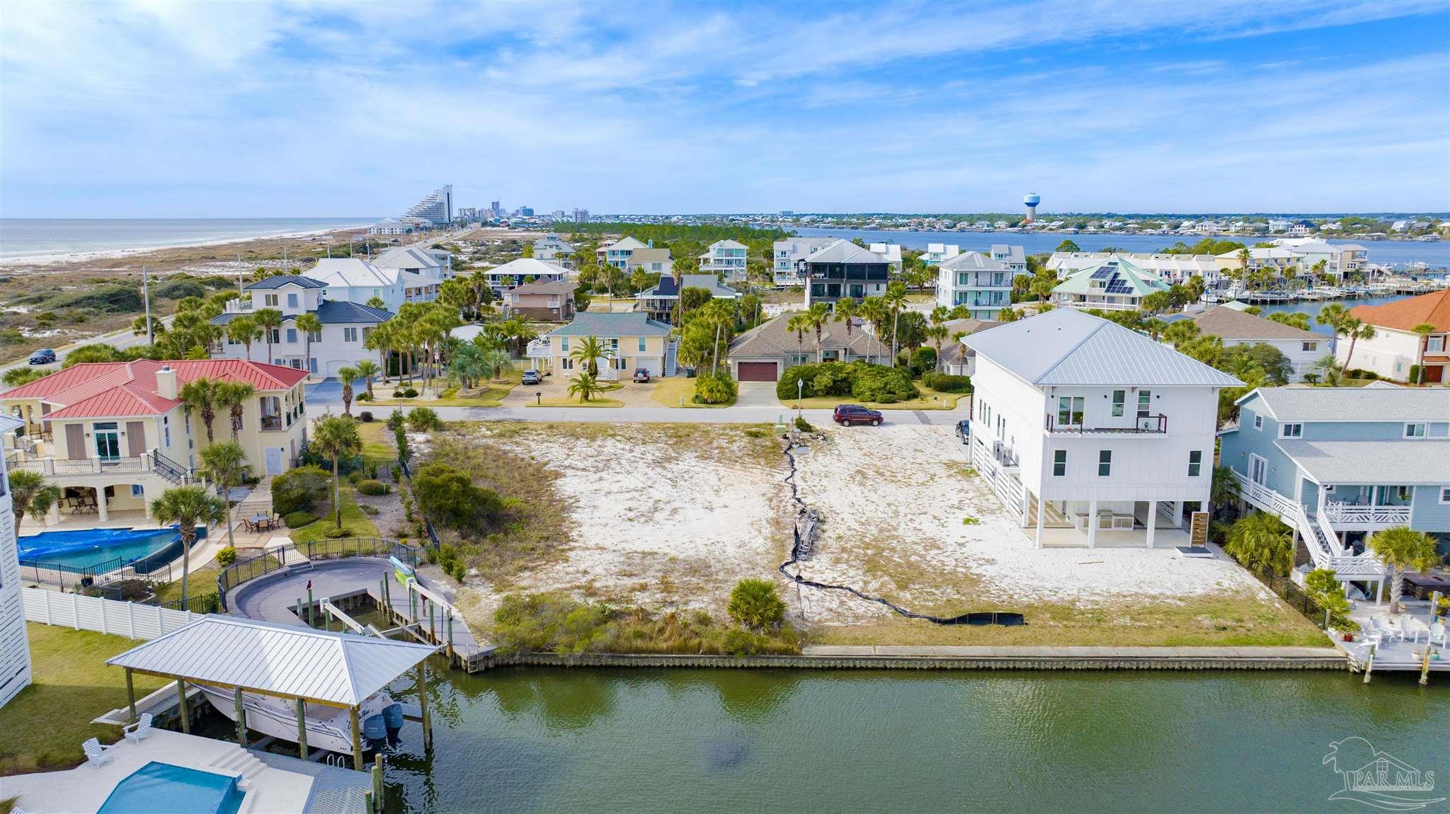 a view of multiple houses with outdoor space