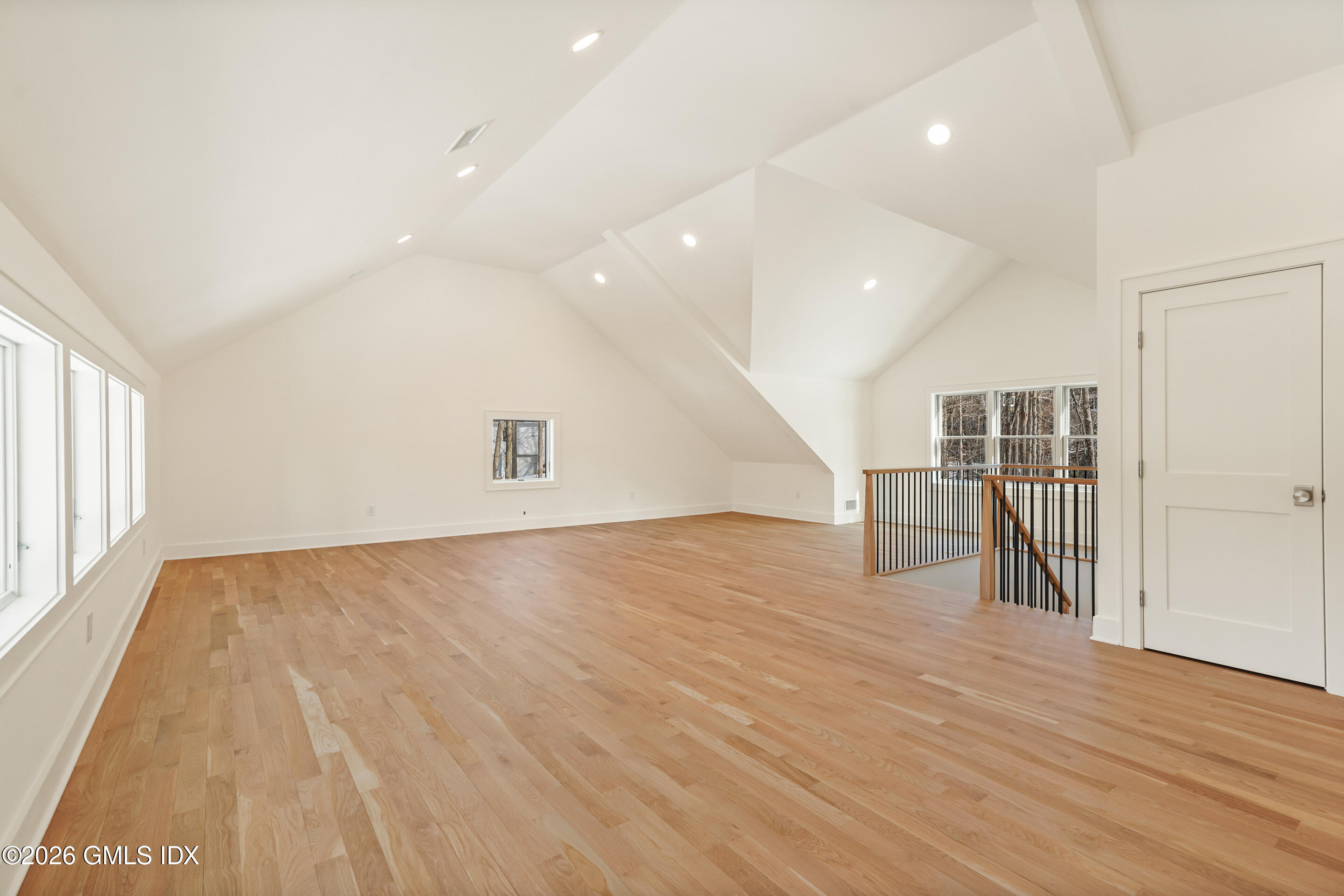 403 Stanwich Road Greenwich, CT 06830 - Photo 18 of 31 wooden floor in an empty room with a window