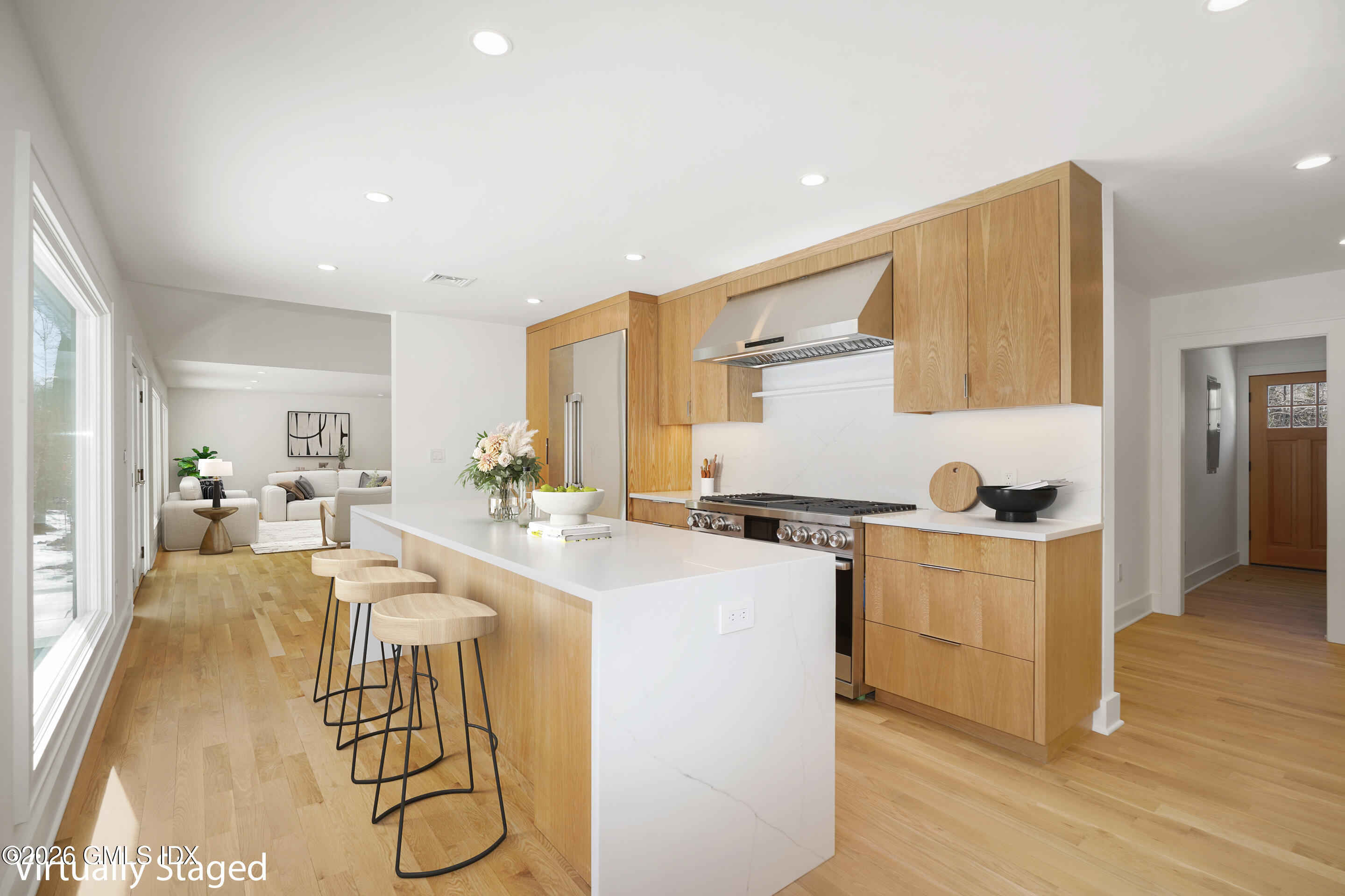 403 Stanwich Road Greenwich, CT 06830 - Photo 3 of 31 a large kitchen with sink a stove and cabinets