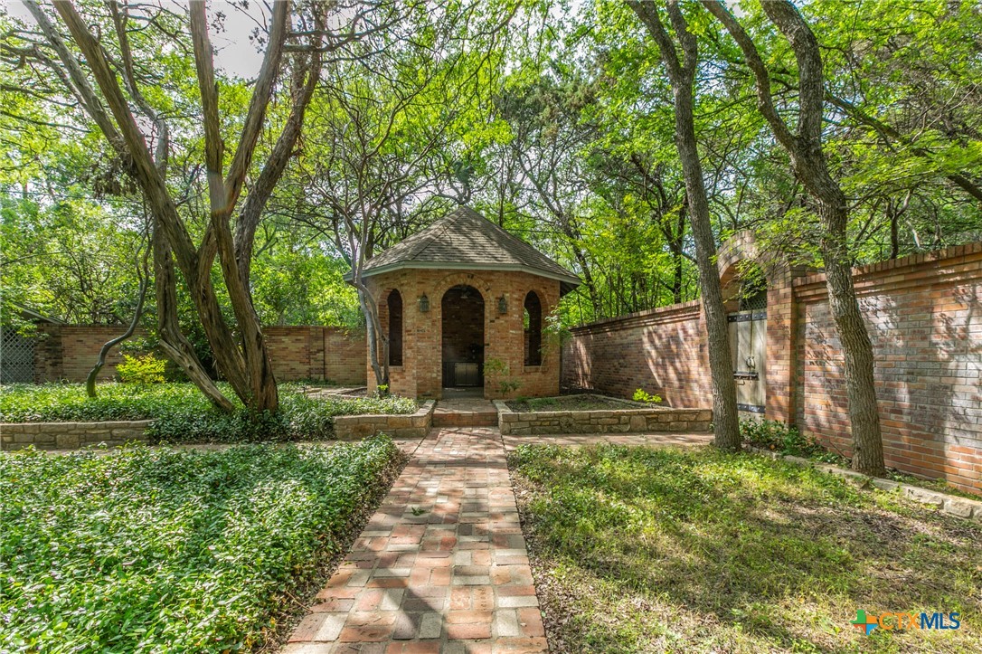 2518 Marlandwood Road Temple, TX 76502 - Photo 38 of 48 a front view of a house with garden