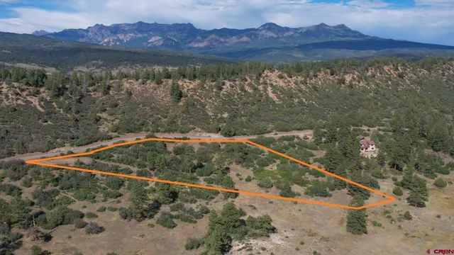 a view of entryway with wooden stairs
