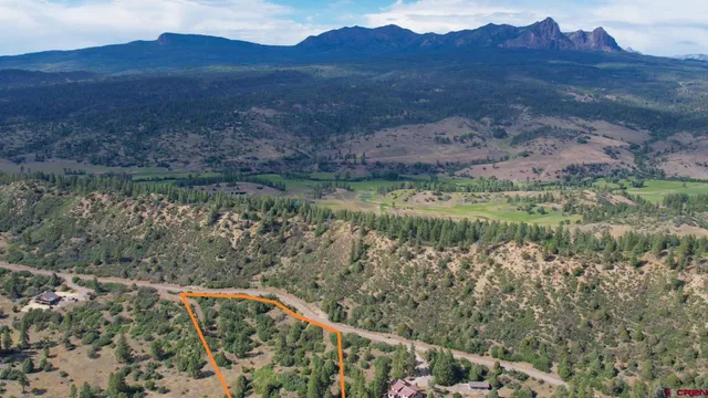 a view of lake with mountain