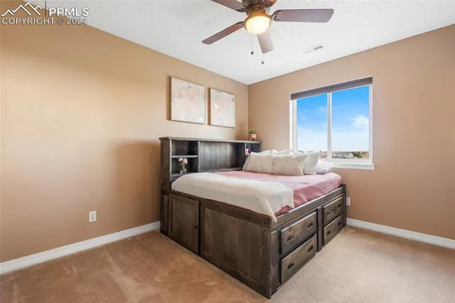 a bathroom with a sink a vanity and a mirror