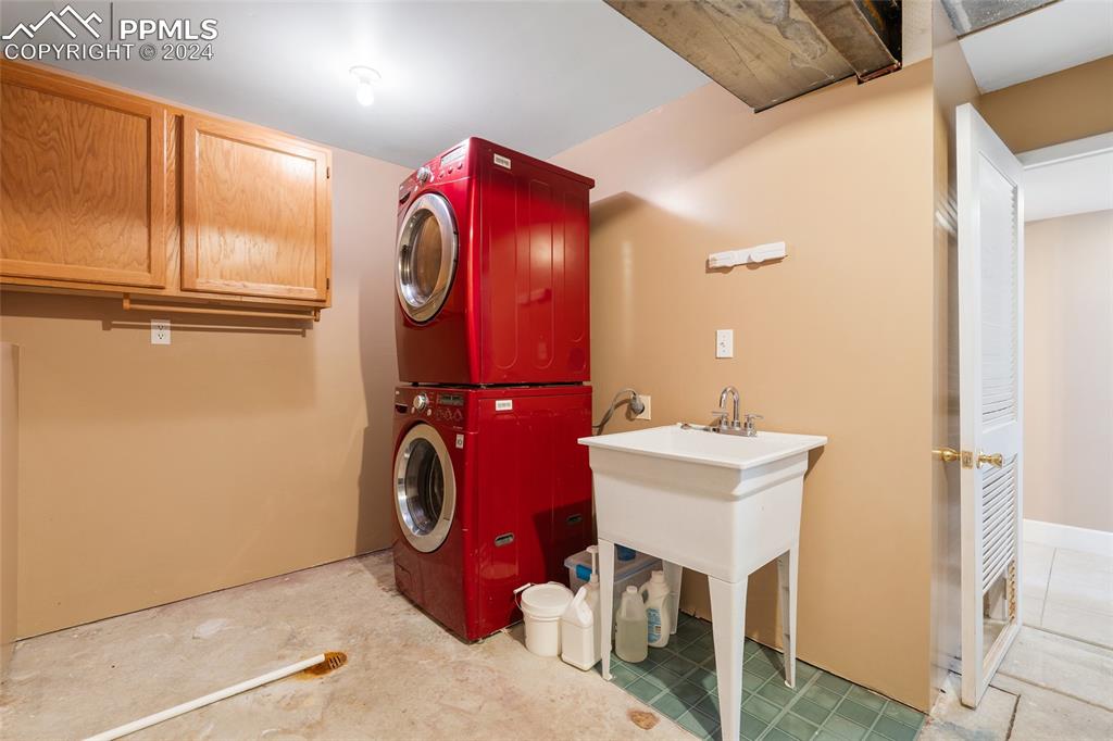 16145 Turftop Terrace Elbert, CO 80106 - Photo 23 of 29 a utility room with dryer and washer