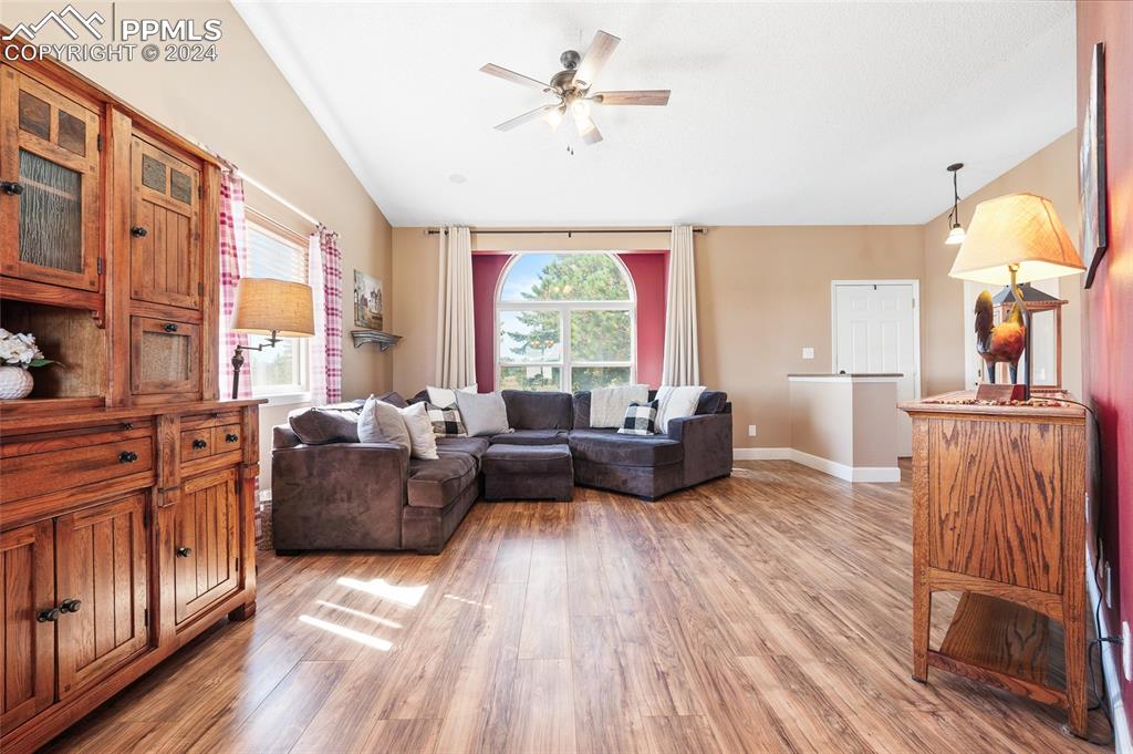 16145 Turftop Terrace Elbert, CO 80106 - Photo 5 of 29 a living room with furniture and a large window