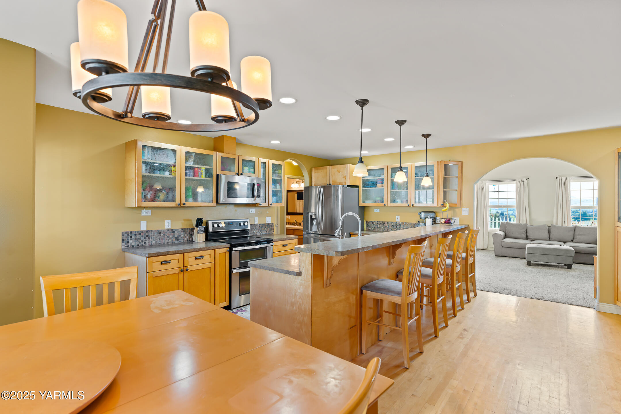 620 Tibbling Road Selah, WA 98942 - Photo 15 of 60 a kitchen with stainless steel appliances kitchen island granite countertop a sink and cabinets