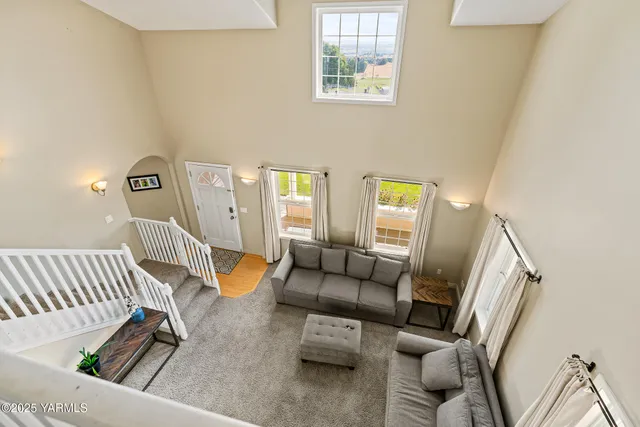 a bathroom with a tub shower vanity and a sink