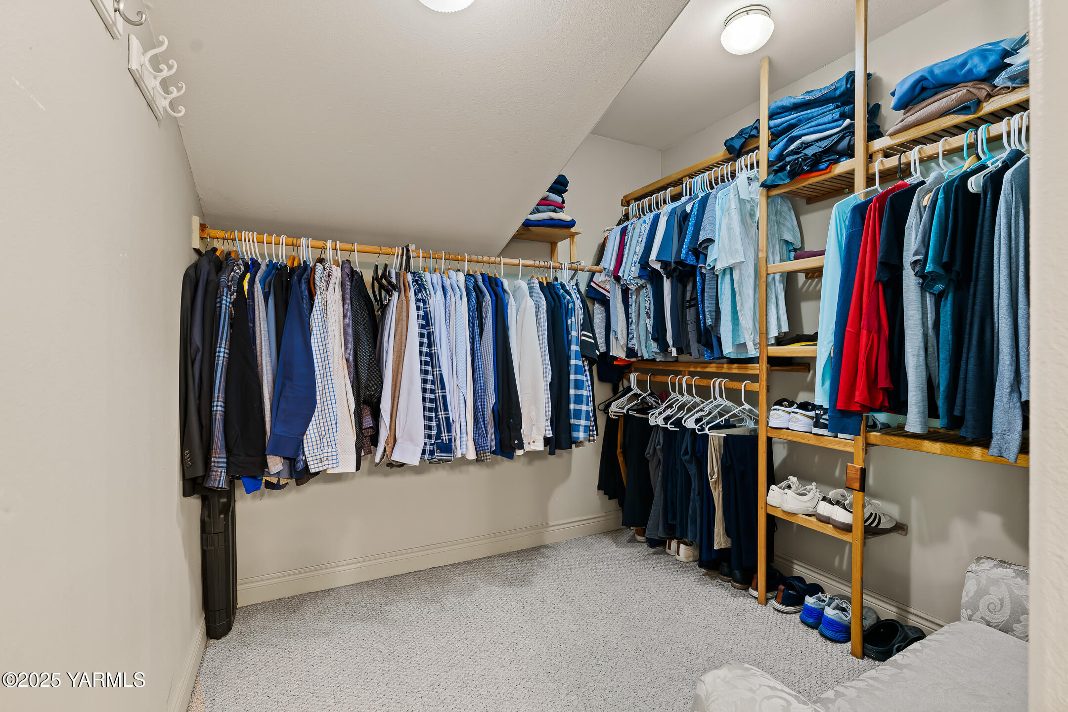 620 Tibbling Road Selah, WA 98942 - Photo 30 of 60 a view of walk in closet with clothes and shoes