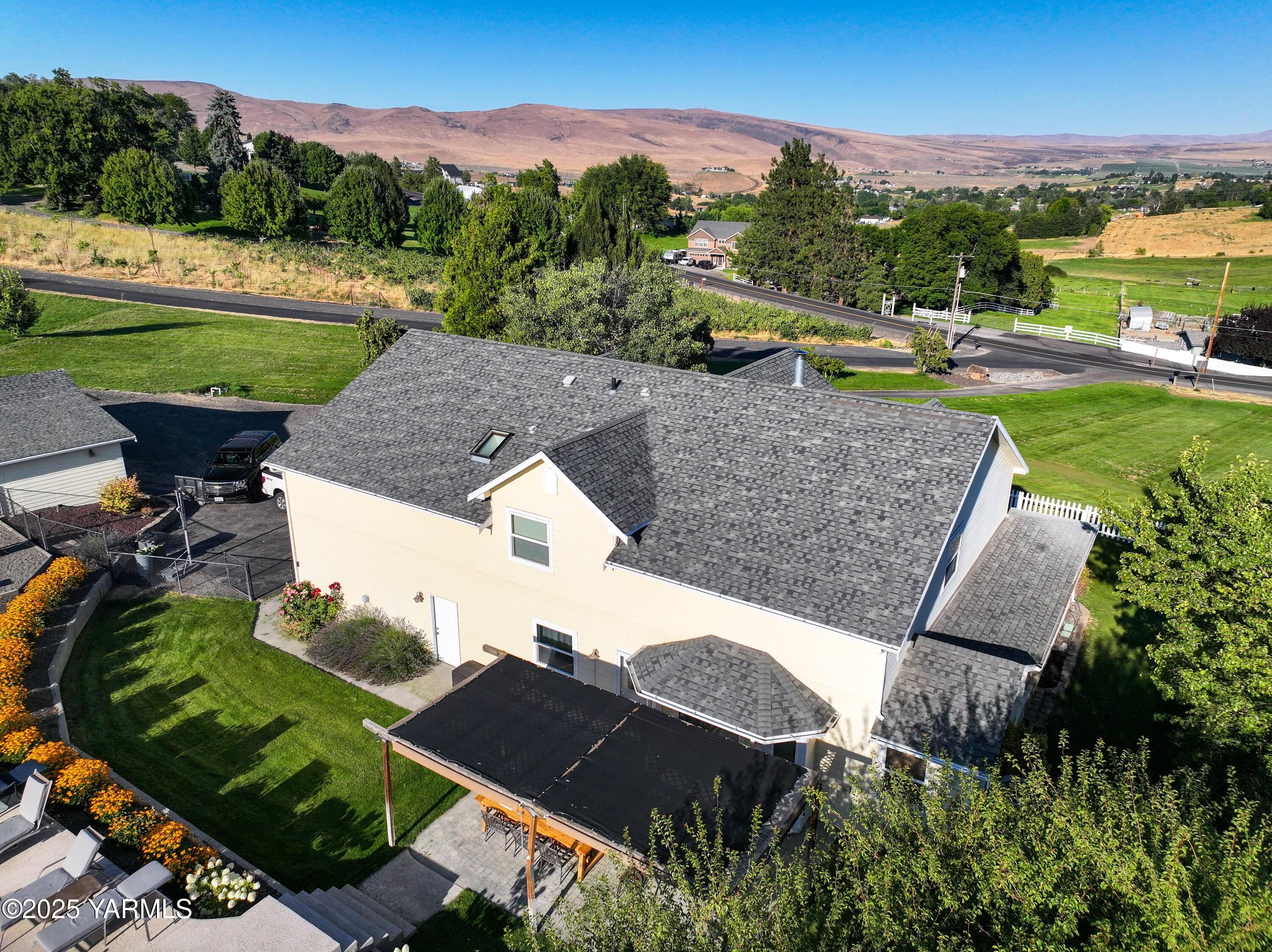 620 Tibbling Road Selah, WA 98942 - Photo 58 of 60 an aerial view of a house with garden space and street view