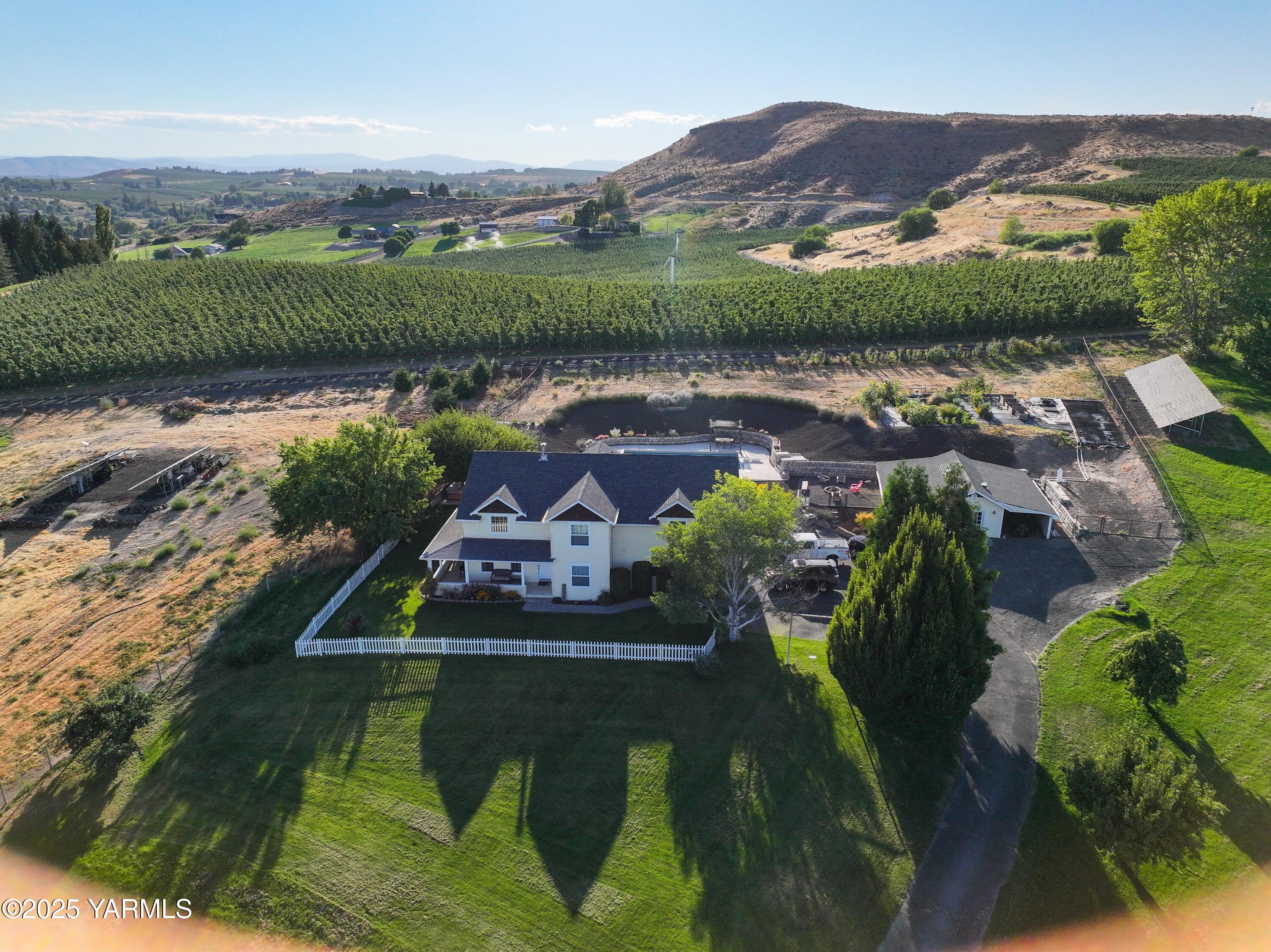620 Tibbling Road Selah, WA 98942 - Photo 59 of 60 an aerial view of a house with garden space and lake view