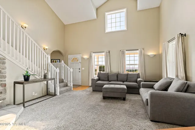 a dining hall with stainless steel appliances a dining table and chairs with wooden floor