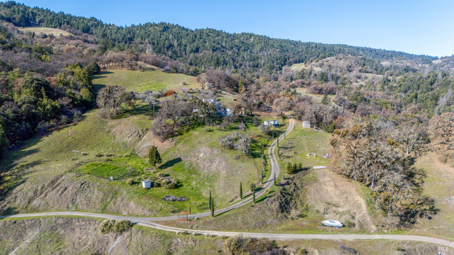 6620 Robinson Creek Road Ukiah, CA 95482 - Photo 19 of 47 an aerial view of a houses with a yard