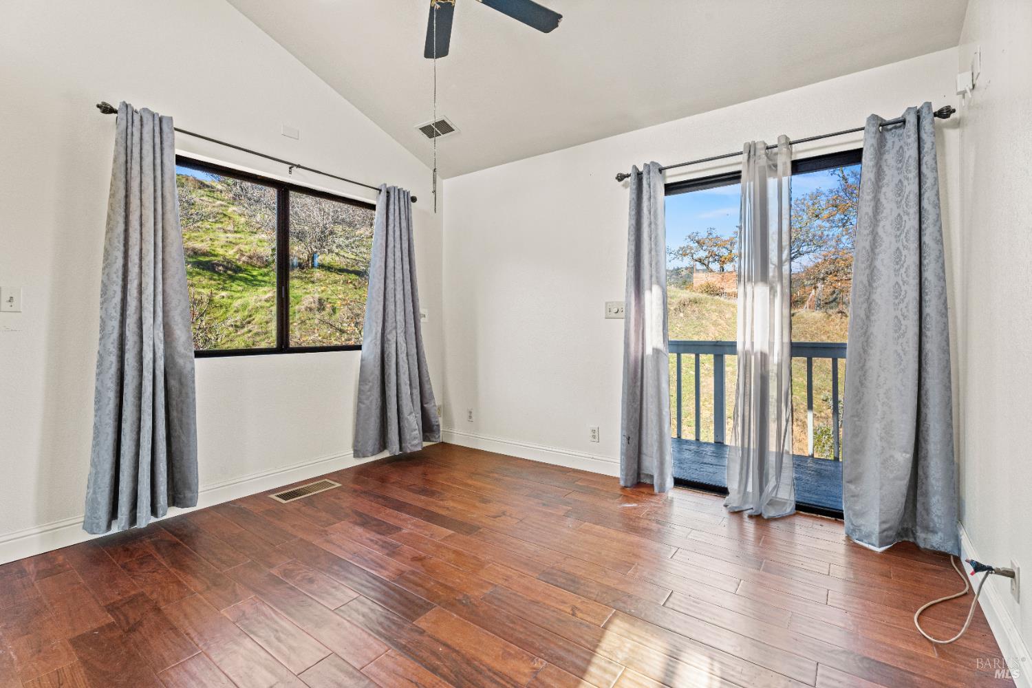 6620 Robinson Creek Road Ukiah, CA 95482 - Photo 28 of 47 wooden floor in an empty room with a window