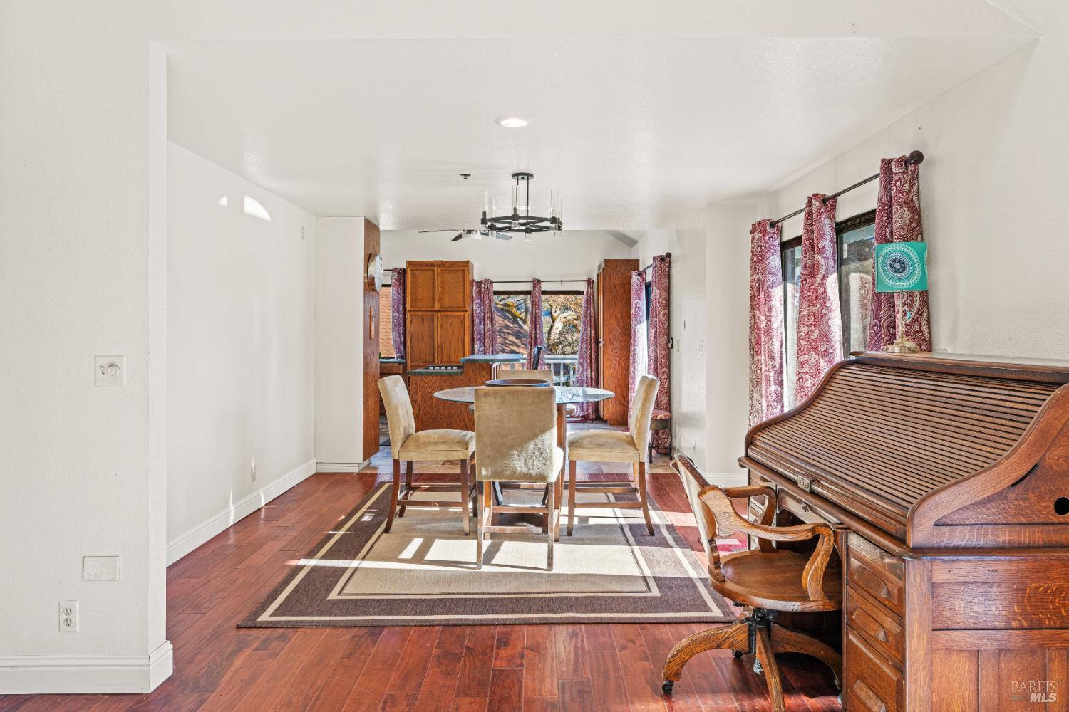 6620 Robinson Creek Road Ukiah, CA 95482 - Photo 42 of 47 a view of a dining room with furniture wooden floor and chandelier