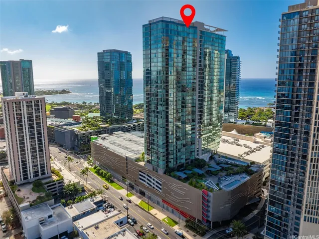 a view of a backyard with sitting area
