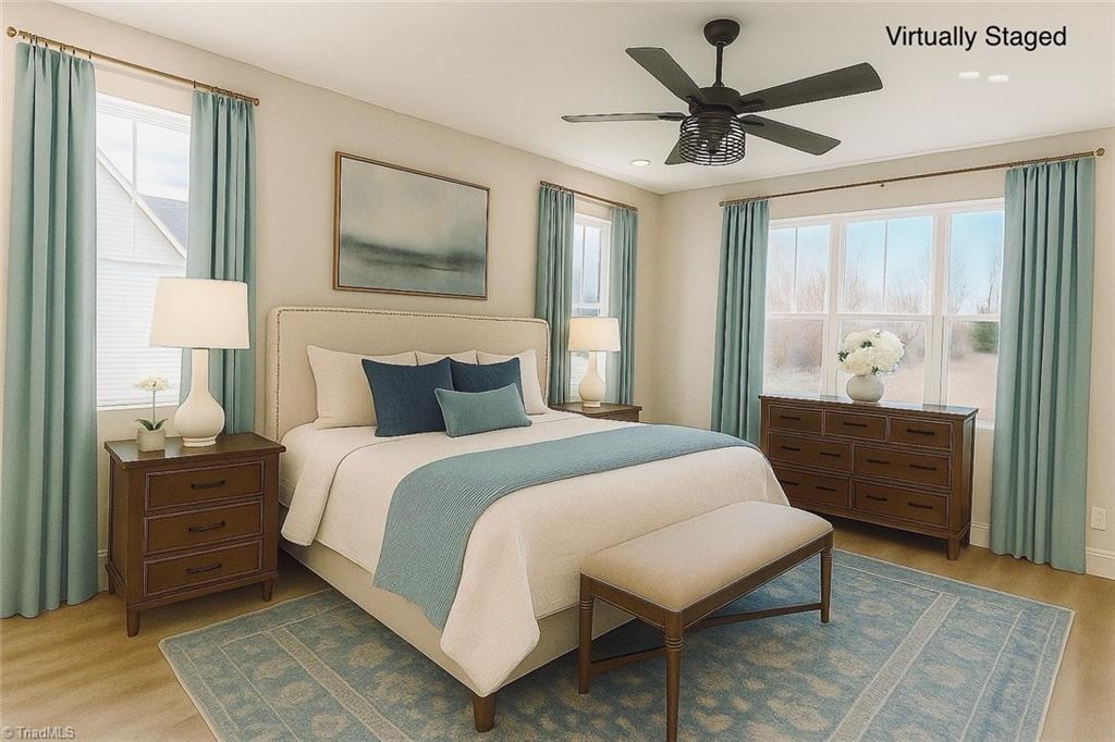 8810 Rudy Drive Kernersville, NC 27284 - Photo 20 of 48 Primary Bedroom on main floor - virtually staged