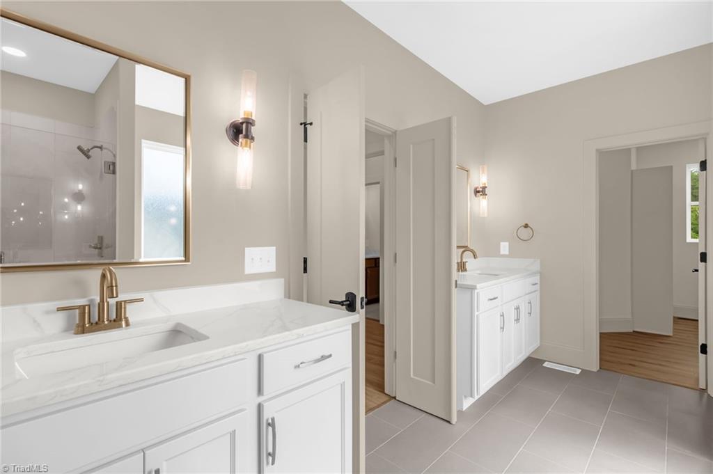 8810 Rudy Drive Kernersville, NC 27284 - Photo 22 of 48 Primary En-Suite