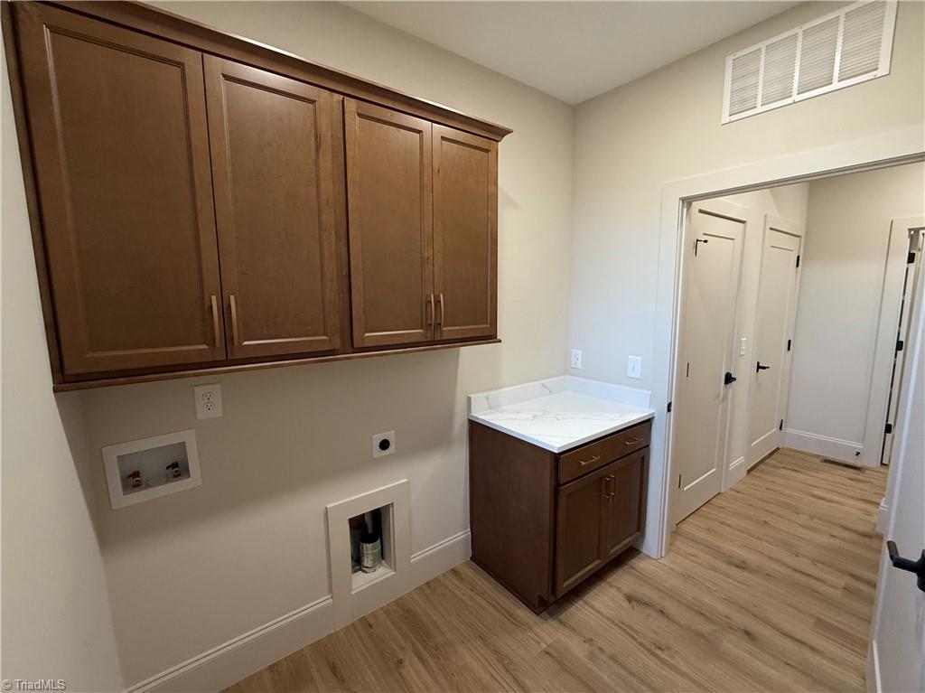 8810 Rudy Drive Kernersville, NC 27284 - Photo 30 of 48 Main level laundry