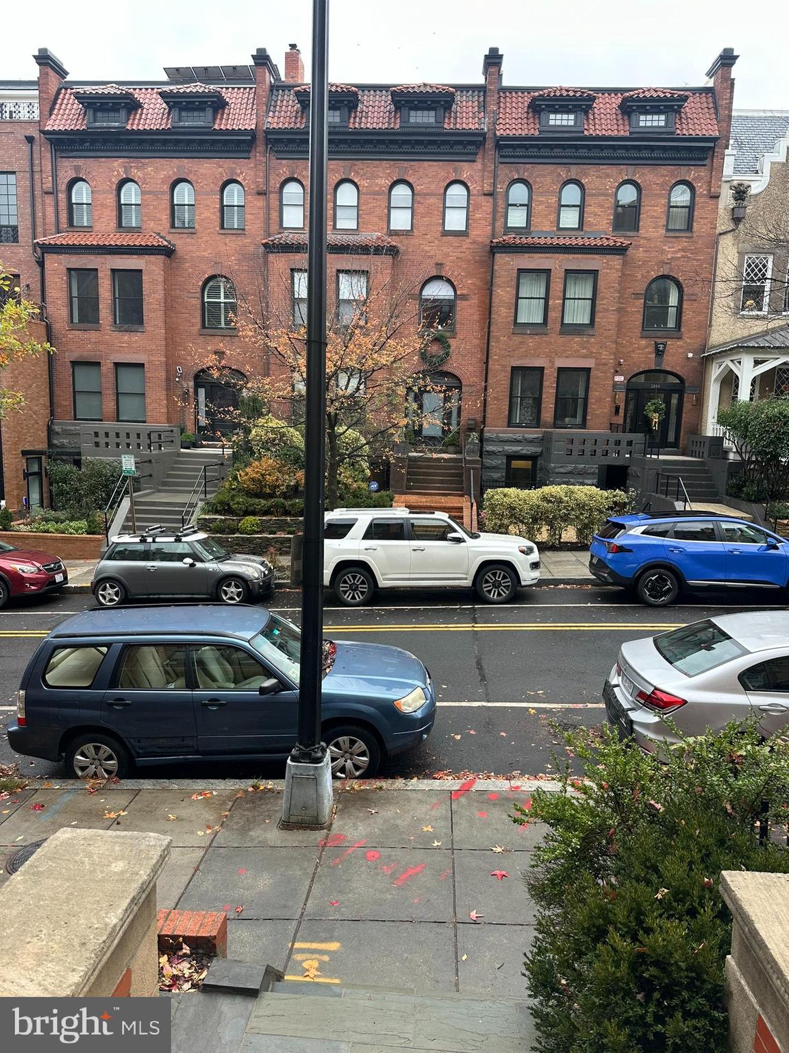 1837 Kalorama Road Northwest, Unit B Washington, DC 20009 - Photo 2 of 45 a couple of cars parked in front of a building