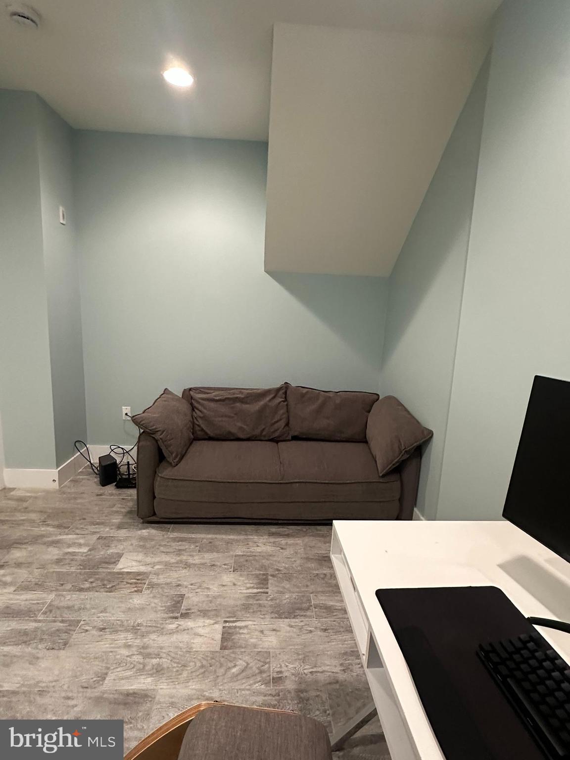 1837 Kalorama Road Northwest, Unit B Washington, DC 20009 - Photo 34 of 45 a living room with furniture and a rug