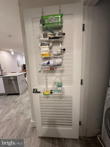 a bathroom with a toilet and a bathtub