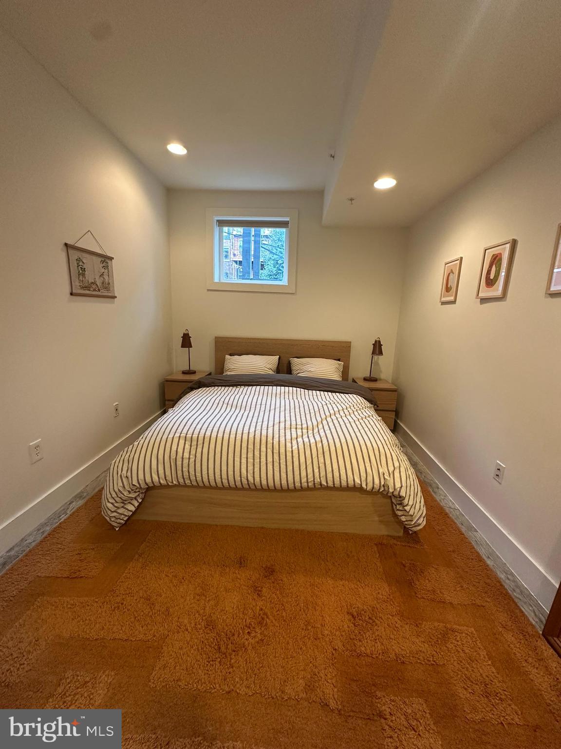 1837 Kalorama Road Northwest, Unit B Washington, DC 20009 - Photo 4 of 45 a bedroom with a bed and a window