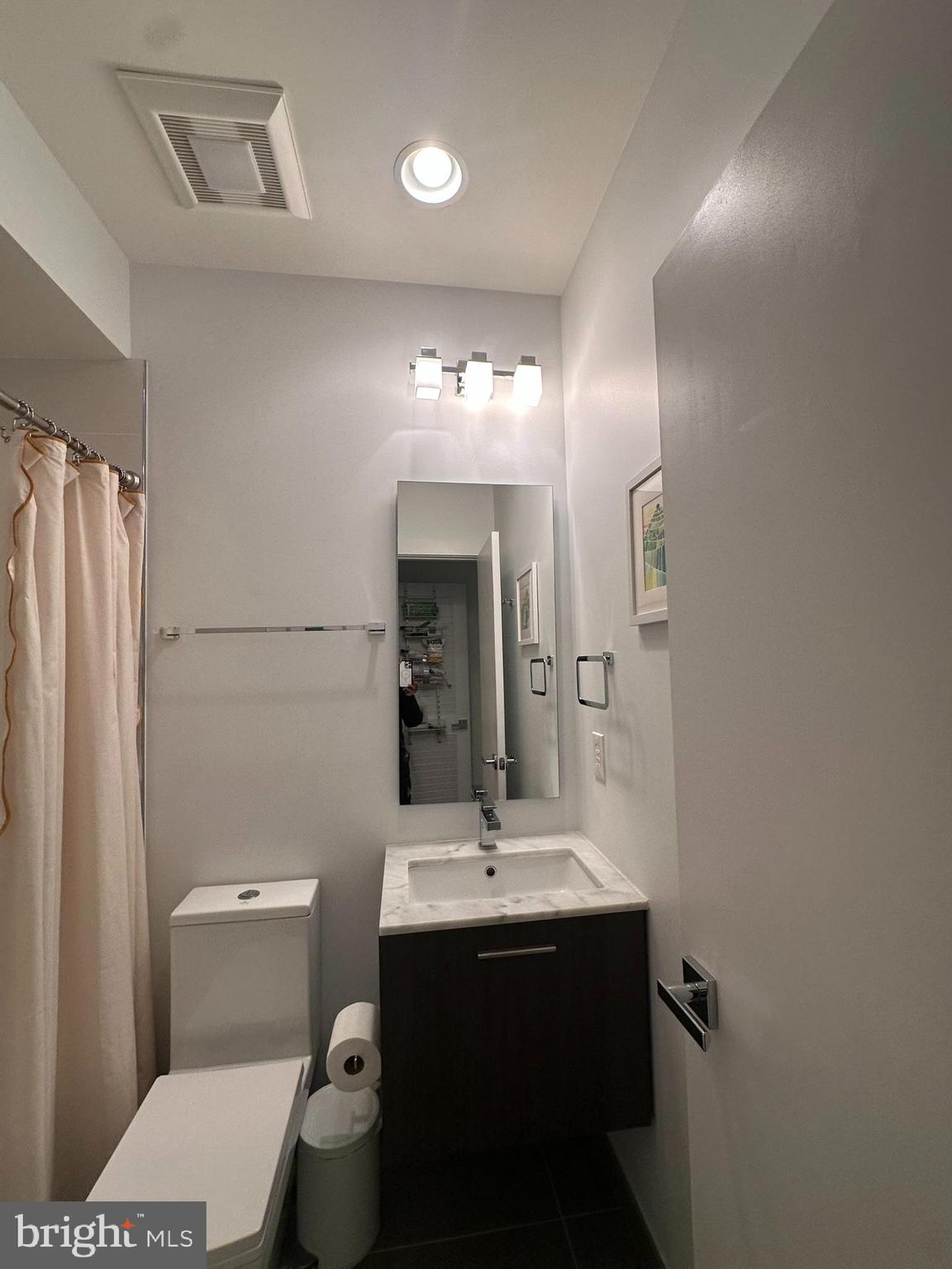 1837 Kalorama Road Northwest, Unit B Washington, DC 20009 - Photo 41 of 45 a bathroom with a sink toilet and shower