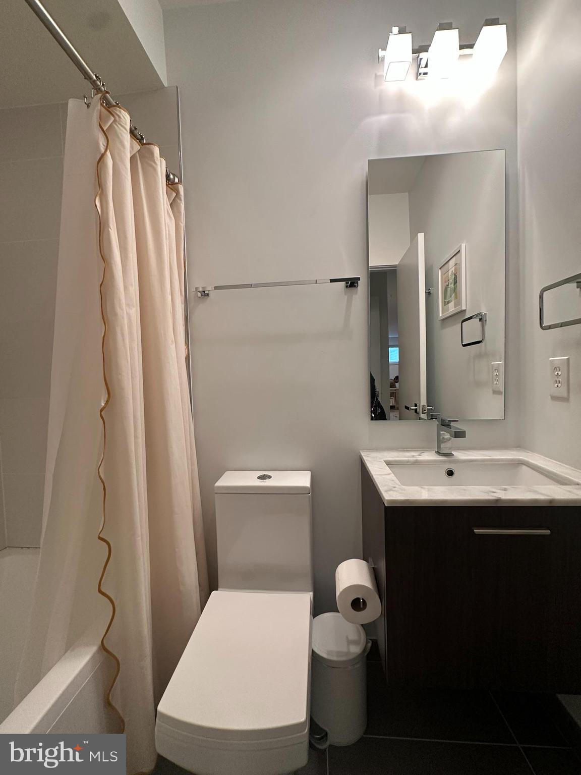 1837 Kalorama Road Northwest, Unit B Washington, DC 20009 - Photo 42 of 45 a bathroom with a sink toilet and shower