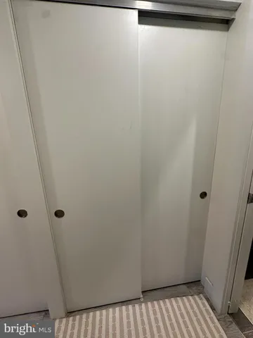 a bathroom with a sink vanity and mirror