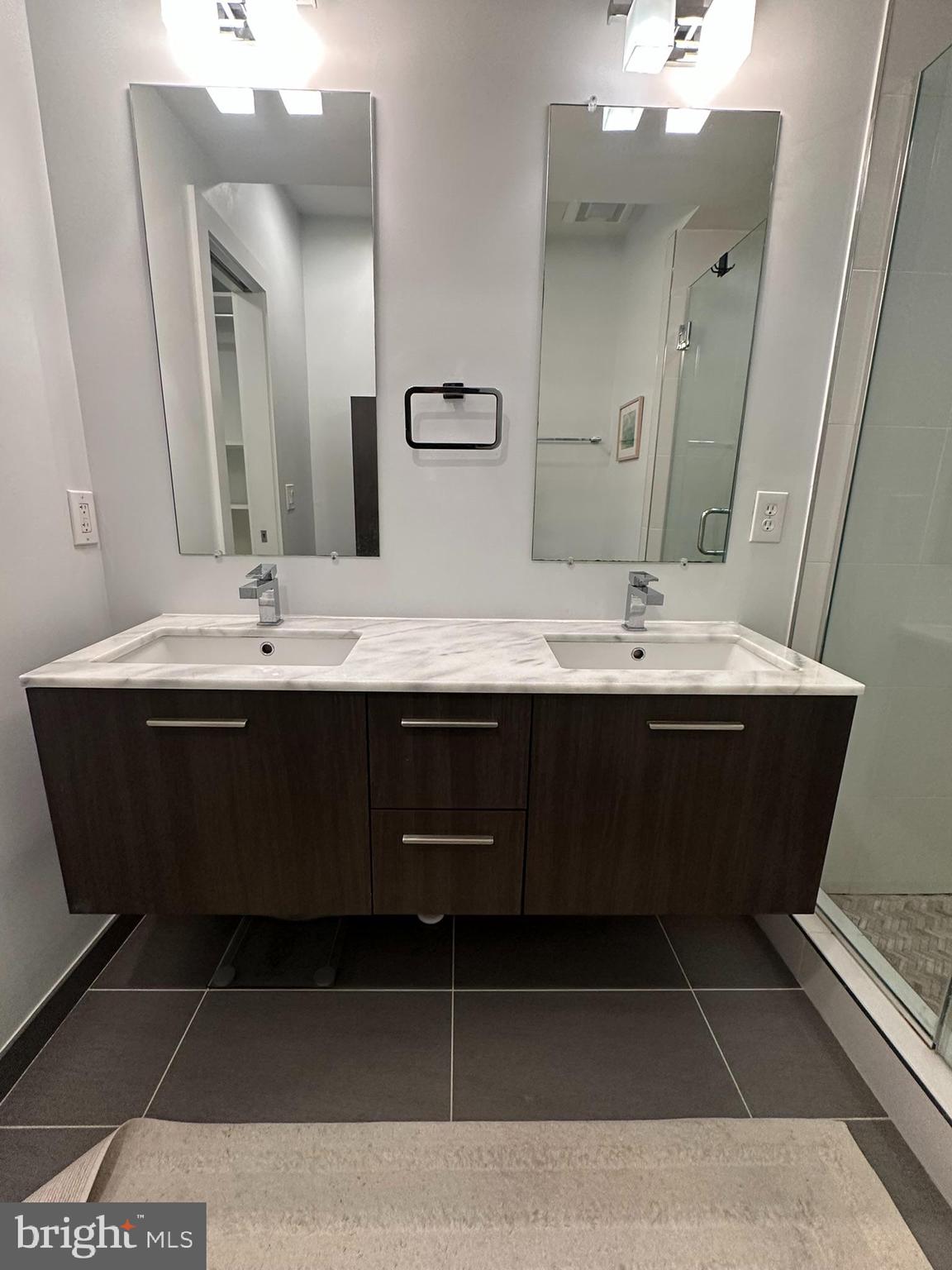 1837 Kalorama Road Northwest, Unit B Washington, DC 20009 - Photo 10 of 45 a bathroom with a sink vanity and mirror