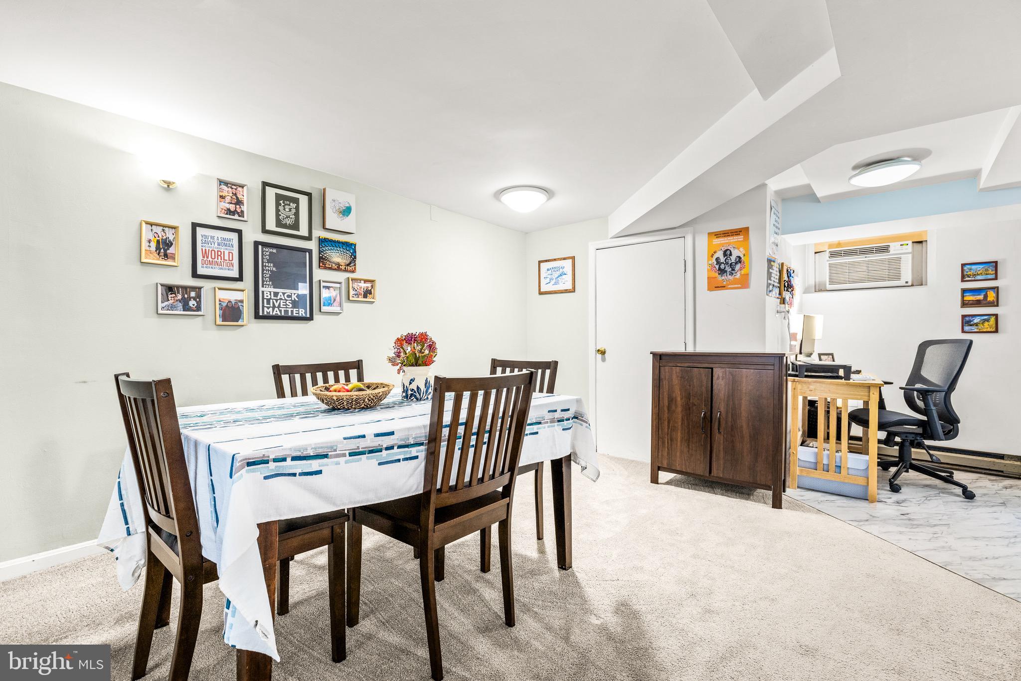 1716 Irving Street Northwest Washington, DC 20010 - Photo 35 of 43 a view of a dining room with furniture