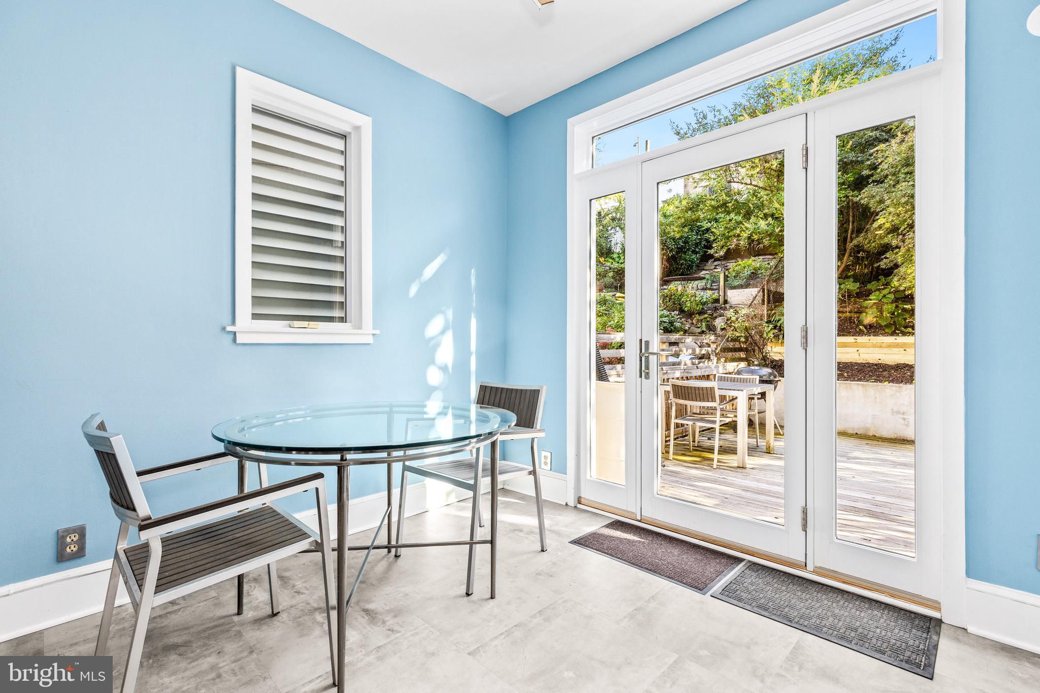 1716 Irving Street Northwest Washington, DC 20010 - Photo 8 of 43 a view of a room that has a window and outside view