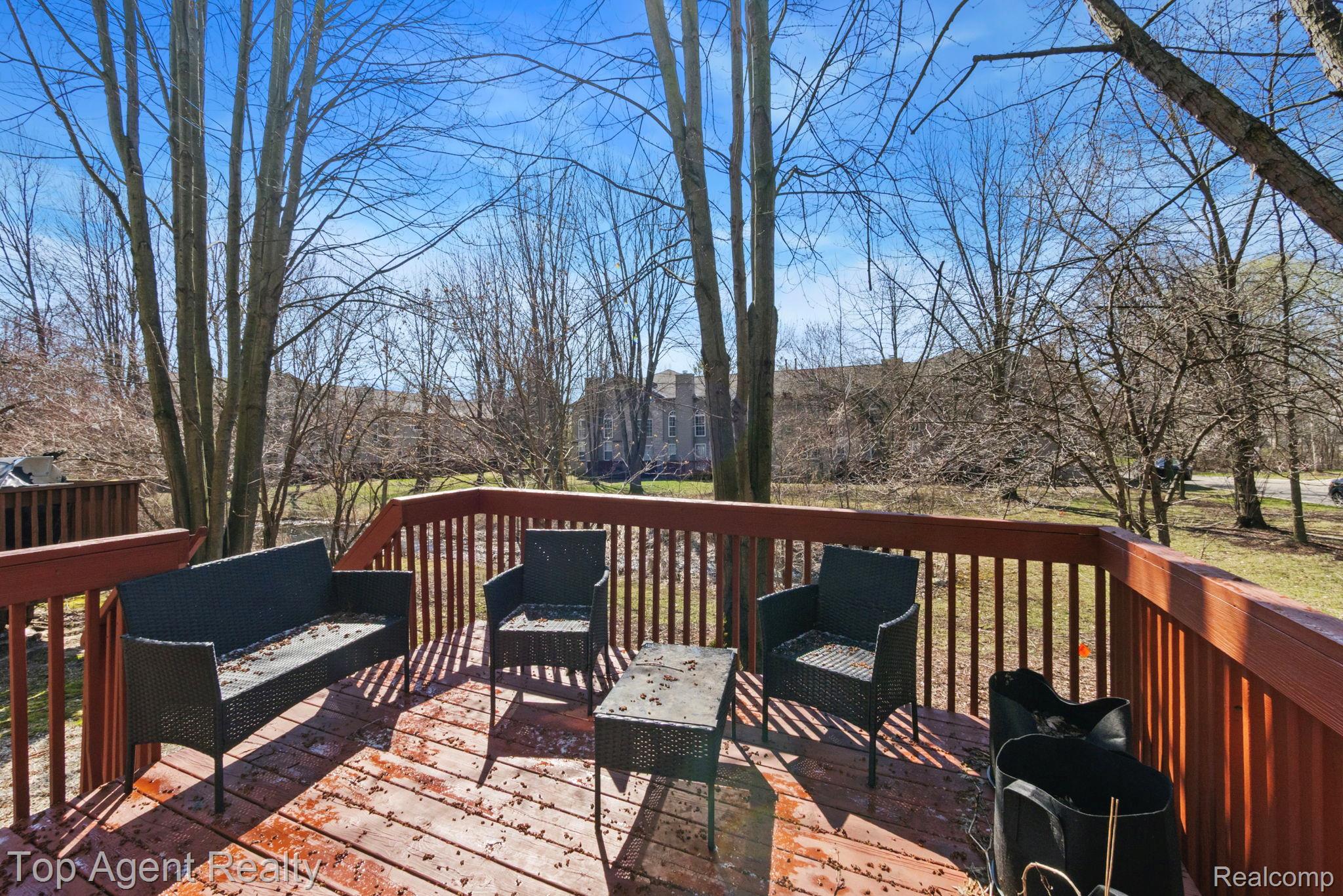 41567 Glade Road, Unit 20 Canton, MI 48187 - Photo 42 of 47 View of wooden deck