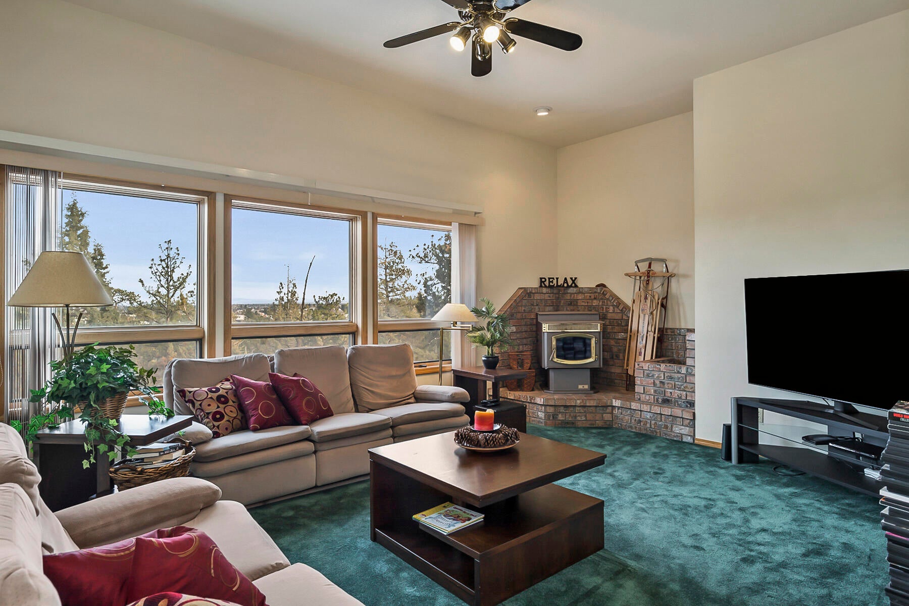3808 Northwest Summerfield Road Bend, OR 97703 - Photo 21 of 38 Sunken family room with cozy pellet stove.
