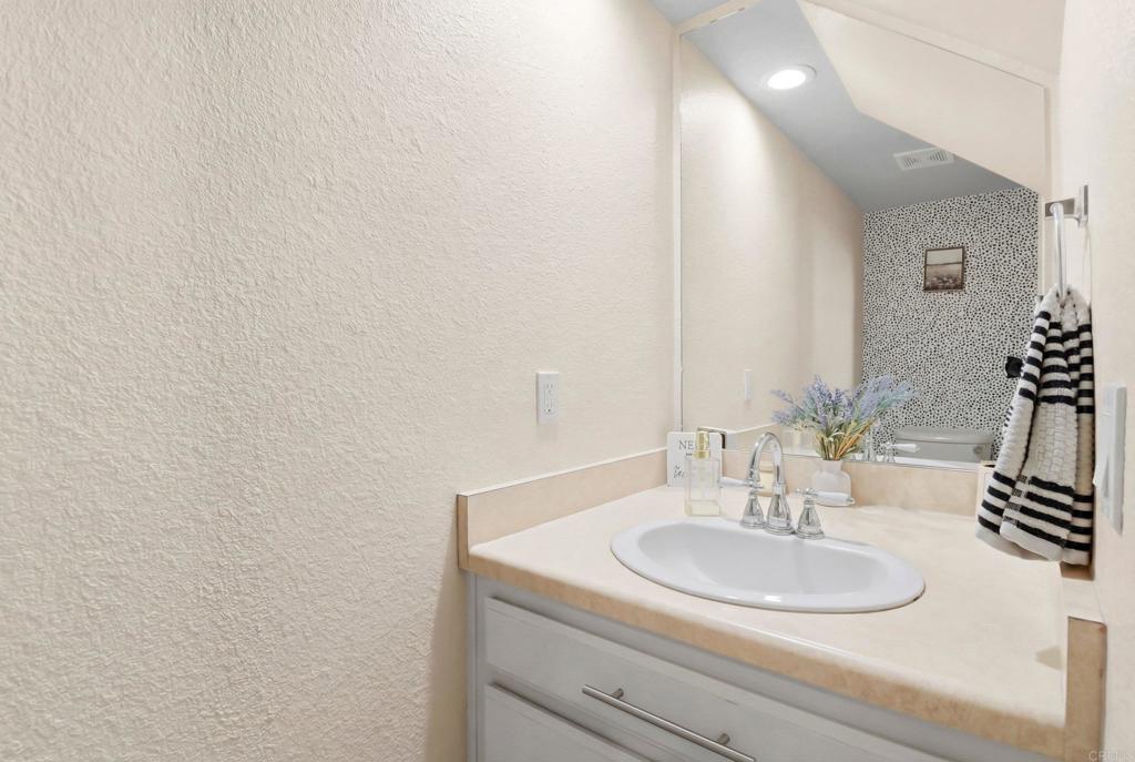1988 Arnold Way Alpine, CA 91901 - Photo 12 of 22 a bathroom with a sink and a mirror