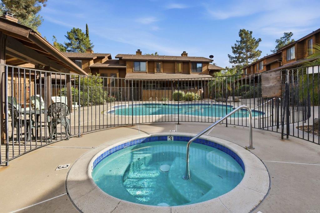 1988 Arnold Way Alpine, CA 91901 - Photo 19 of 22 a view of a house with a swimming pool