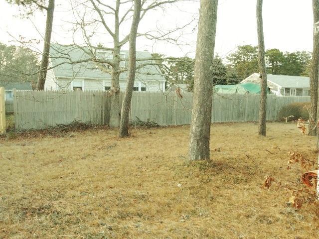 61 Lawrence Road Dennis Port, MA 02639 - Photo 13 of 14 a view of a yard