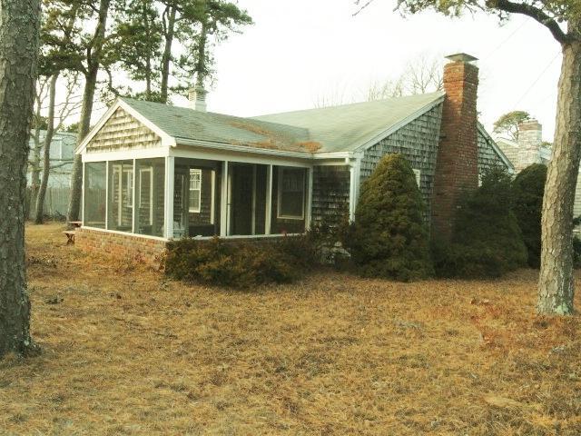 61 Lawrence Road Dennis Port, MA 02639 - Photo 2 of 14 a view of a house with a yard