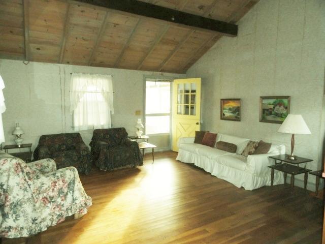 61 Lawrence Road Dennis Port, MA 02639 - Photo 3 of 14 a living room with furniture and a large window