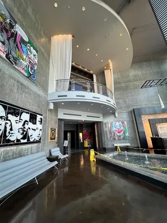 a living room with fireplace furniture and a flat screen tv