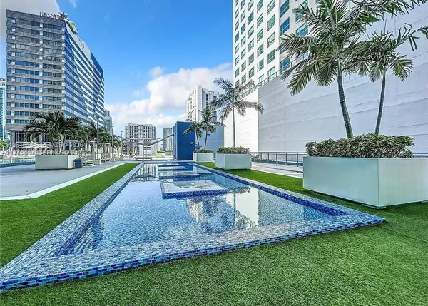 a view of a backyard with a garden and plants