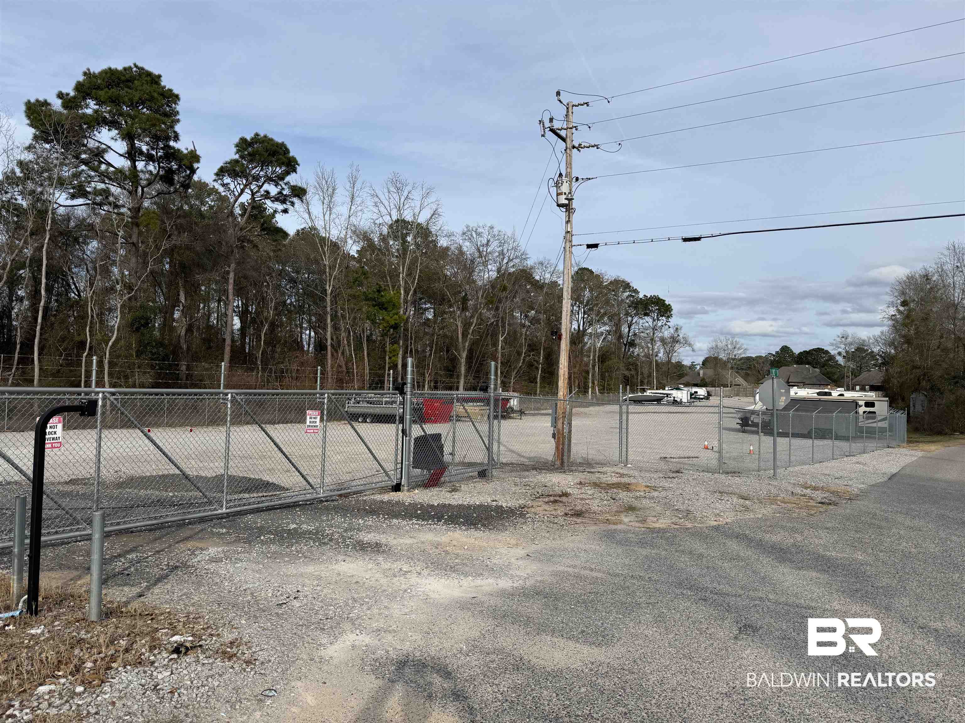 31420 Jessie Road Daphne, AL 36527 - Photo 15 of 23 View of road with a gate