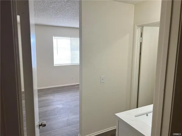 a view of hallway with sink