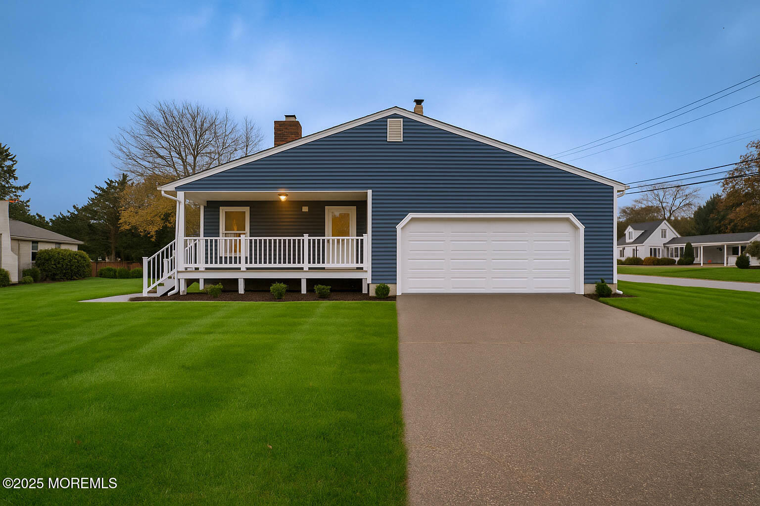 125 Shore Road Marmora, NJ 08223 - Photo 26 of 27 a front view of house with yard and green space