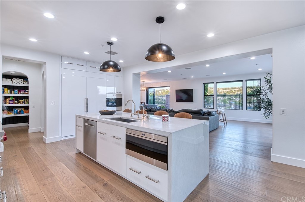 11 Epona Way Ladera Ranch, CA 92694 - Photo 11 of 41 a view of living room with furniture and wooden floor