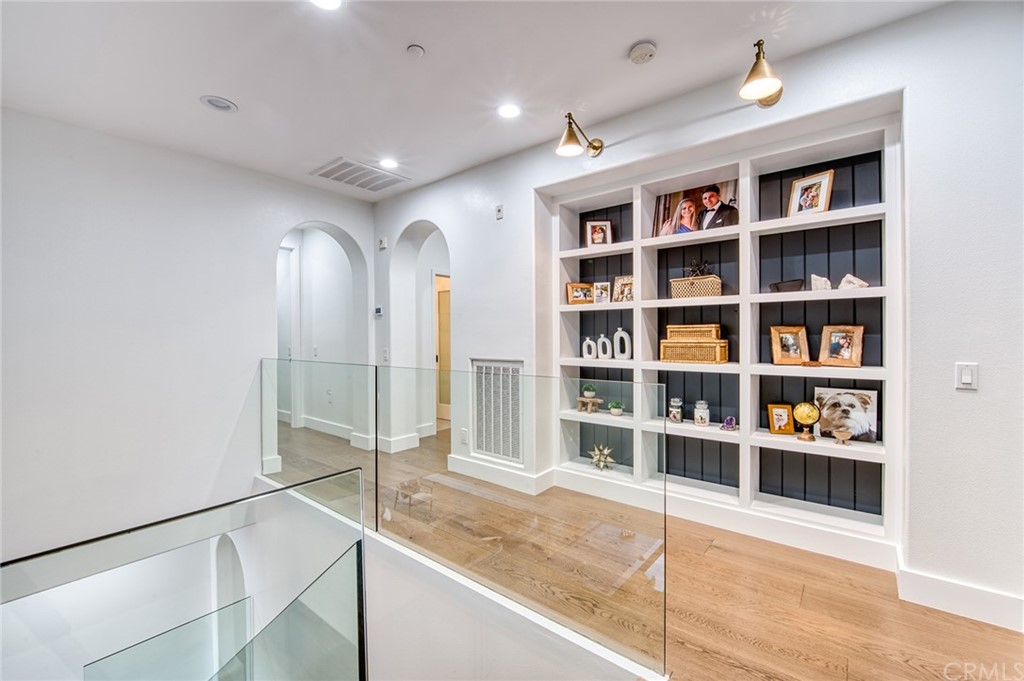 11 Epona Way Ladera Ranch, CA 92694 - Photo 15 of 41 a view of a livingroom with a bookshelf