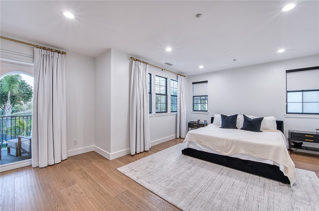 11 Epona Way Ladera Ranch, CA 92694 - Photo 16 of 41 a bedroom with a large bed and a window