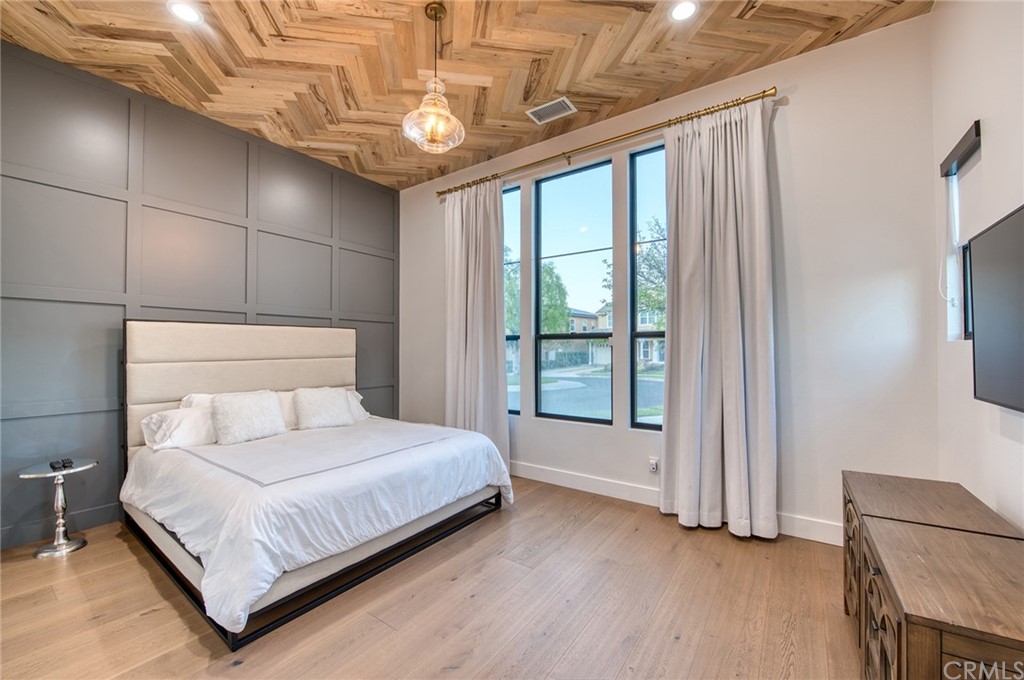 11 Epona Way Ladera Ranch, CA 92694 - Photo 24 of 41 a bedroom with a large bed and a window