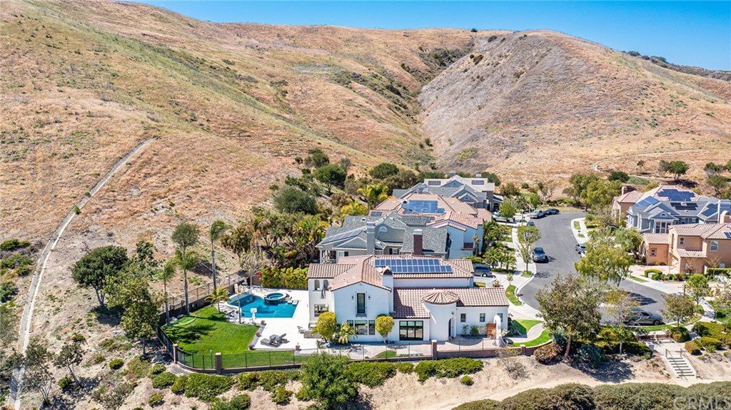 11 Epona Way Ladera Ranch, CA 92694 - Photo 34 of 41 an aerial view of a house with a mountain